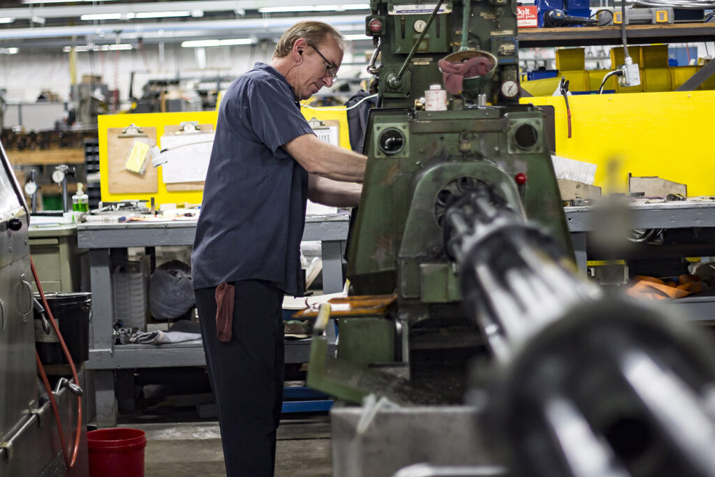 Machinist setting up multi-spindle machine